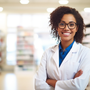 A pharmacist in a pharmacy offering natural desiccated thyroid and levothyroxine